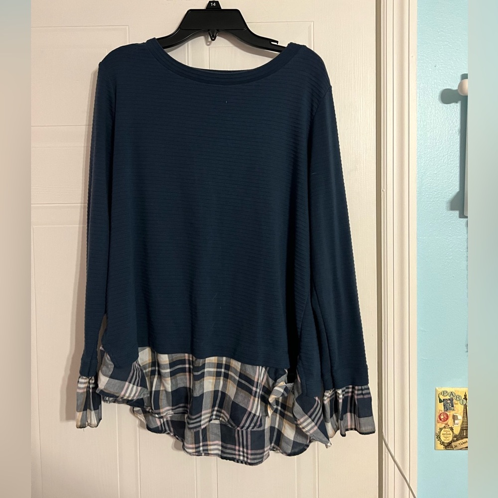 a cute, long sleeved, blue shirt